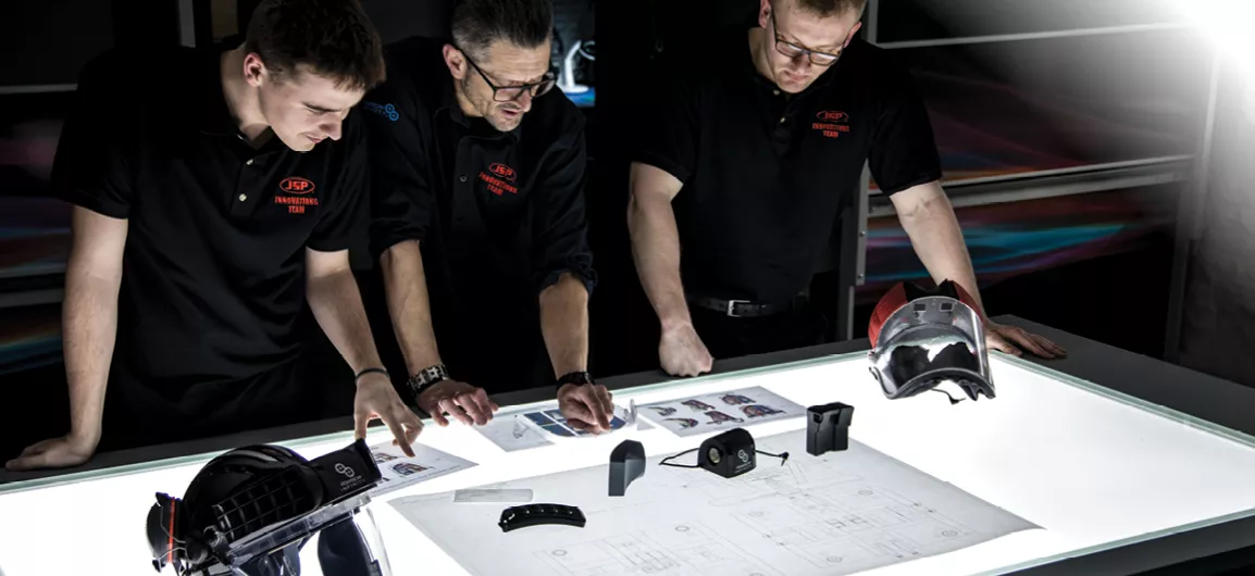 designers working on powercap inifinity respirator